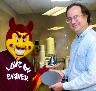 James_Adams_and_Sparky_A_cropped ASU materials science and engineering professor James Adams and ASU Sun Devils mascot Sparky display new materials in a university research lab. Photo: Jessica Slater/ASU