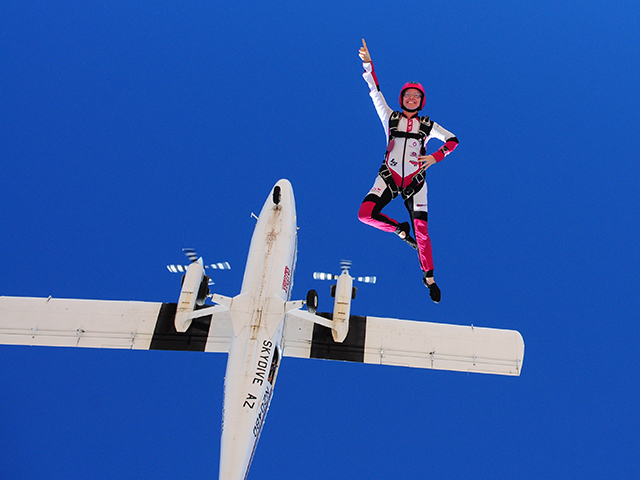 Nadia Kellam skydiving in Eloy, Arizona in October 2014. In addition to skydiving she is a flying trapeze artist and a motorcyclist. Photographer: Robin Kellam