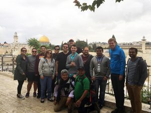 The study abroad group stops for a photo in historic Jerusalem. Photo courtesy of Shaun Wootten