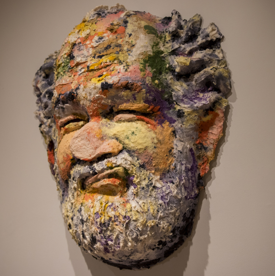 Photo of a sculpture of a man's face. Caption: Works in the exhibit provide examples of the ways in which artists’ images reflect how human neurological factors and geometric perspective can shape our visual experience of objects. Photographer: Marco-Alexis Chaira/ASU