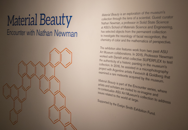 Photo of a wall at the entry of exhibit. Caption: The exhibit includes pieces that relate to Newman’s research collaborations with artists and museum conservators to analyze works of art and the aesthetic features of materials. Photographer: Marco-Alexis Chaira/ASU