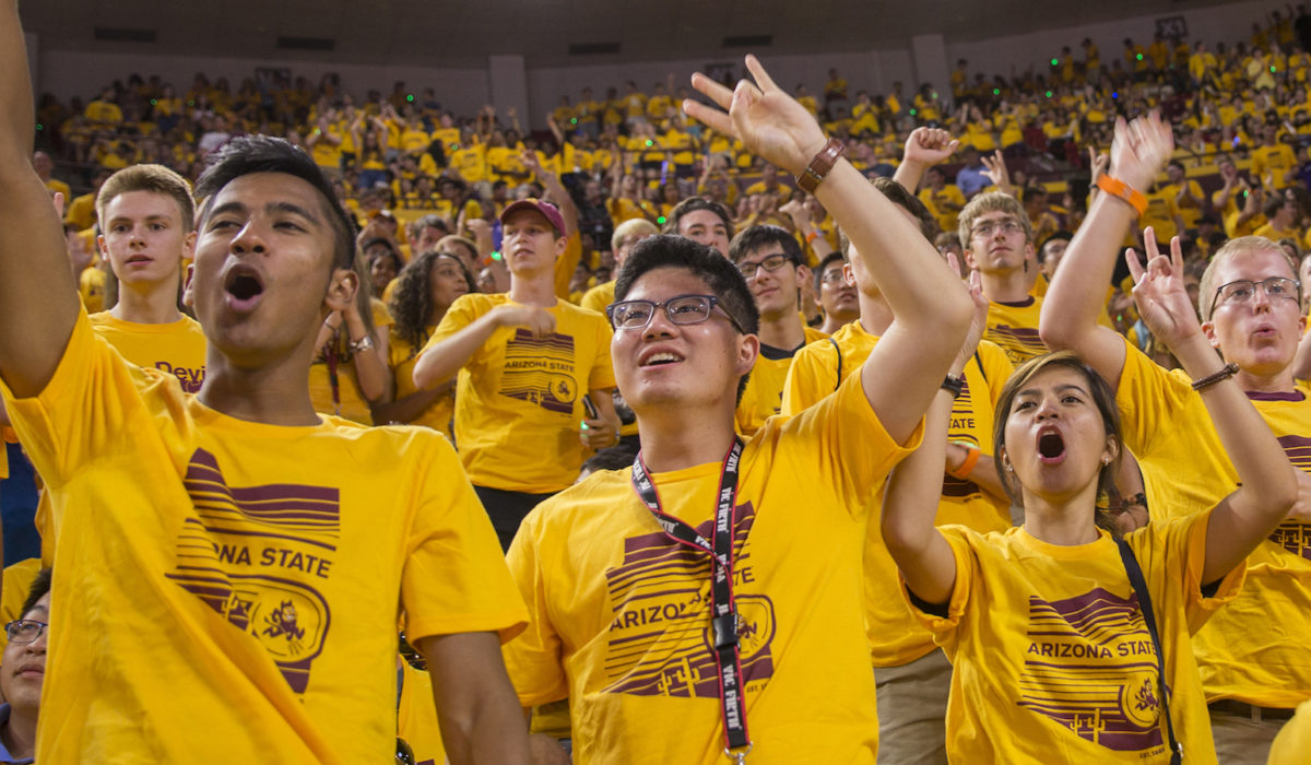 Photo of large amount of students wearing gold shirts inside Wells Fargo Arena. Caption: IRA! IRA! IRA! The Fulton Schools welcomed over 2,700 new students at ASU’s Sun Devil Welcome into the Class of 2021. Read more about the Class of 2021: prod-fullcircle.fsewp.asu.edu/students/meet-class-of-2021 Photographer: Jessica Hocheiter/ASU