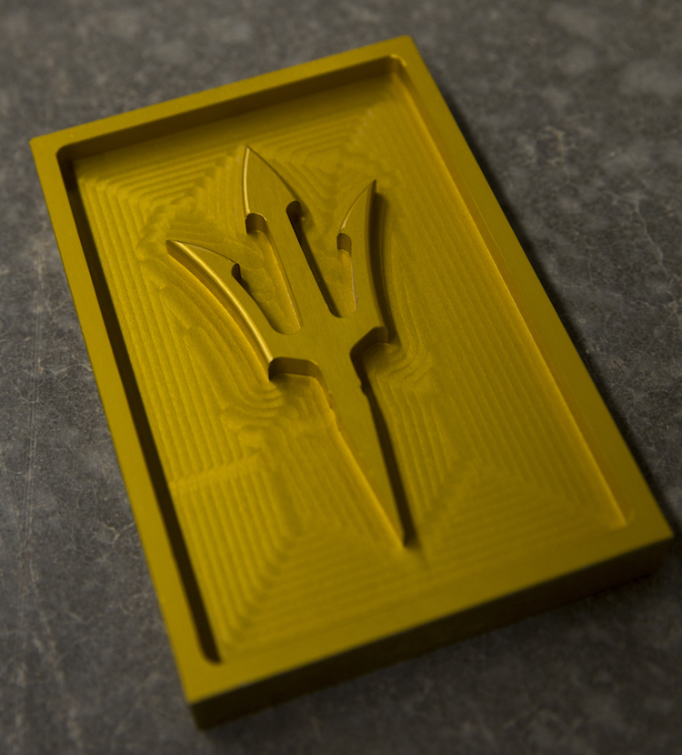 Photo of a 3D printed pitchfork. Caption: With the use of cutting edge plastic, polymer and metal 3D printing equipment, along with advanced processing and analysis capabilities, the Additive Manufacturing Center is the premier hub to develop the next generation of manufacturing engineers in conjunction with industry partners.