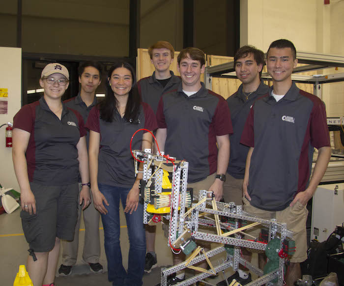 Photo of seven students standing behind a robot. Caption: Arizona State University’s Rossum Rumblers PYRO Team: (from left to right) Olivia Pinkowski, Jonathan Nguyen, Rachel Risher, Andrew Fechter, Nathan Rossi, Ben Levine and Ryan Bodhipaksh. Not pictured: Coach Aaron Dolgin. Photo courtesy of Samantha Blokker