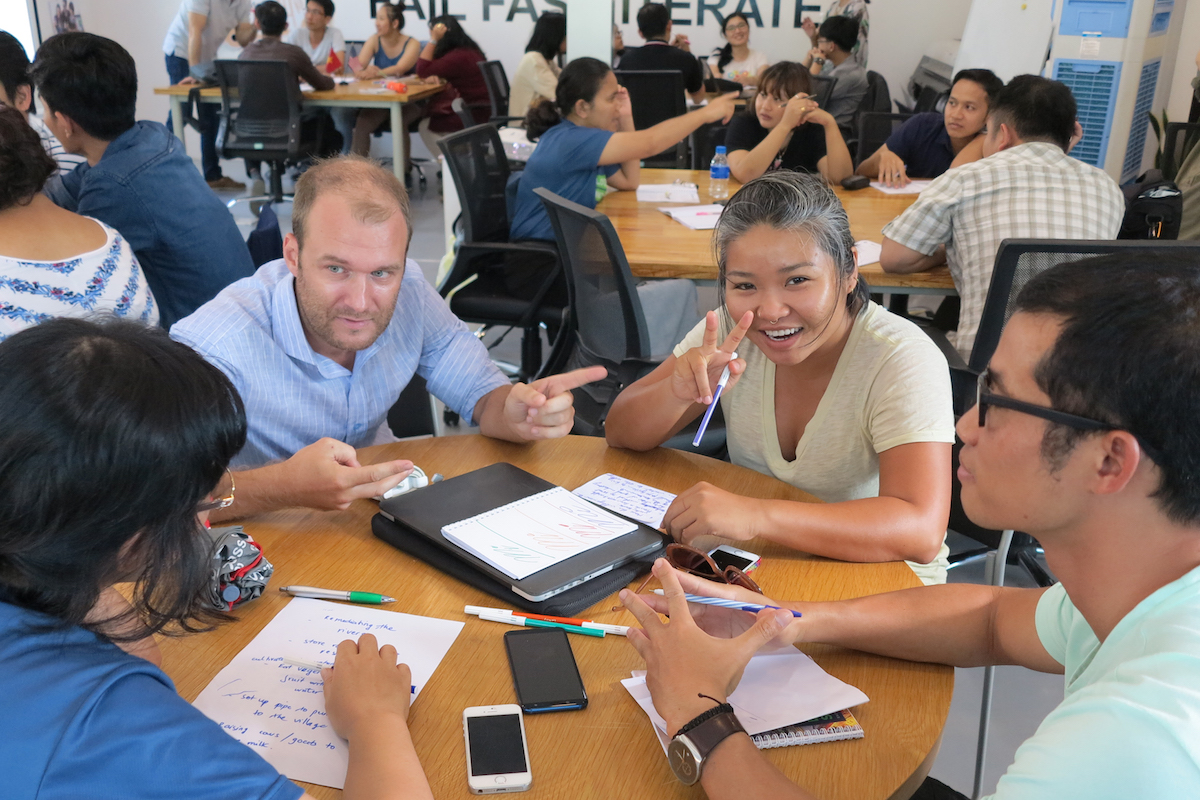 IMG_4992w four people sitting at a table
