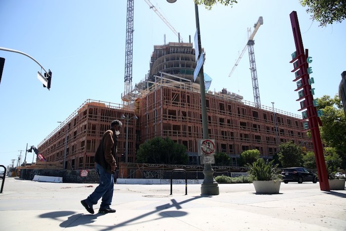 L.A. hunkered down. But it hasn’t stopped building mansions, stadiums and apartments