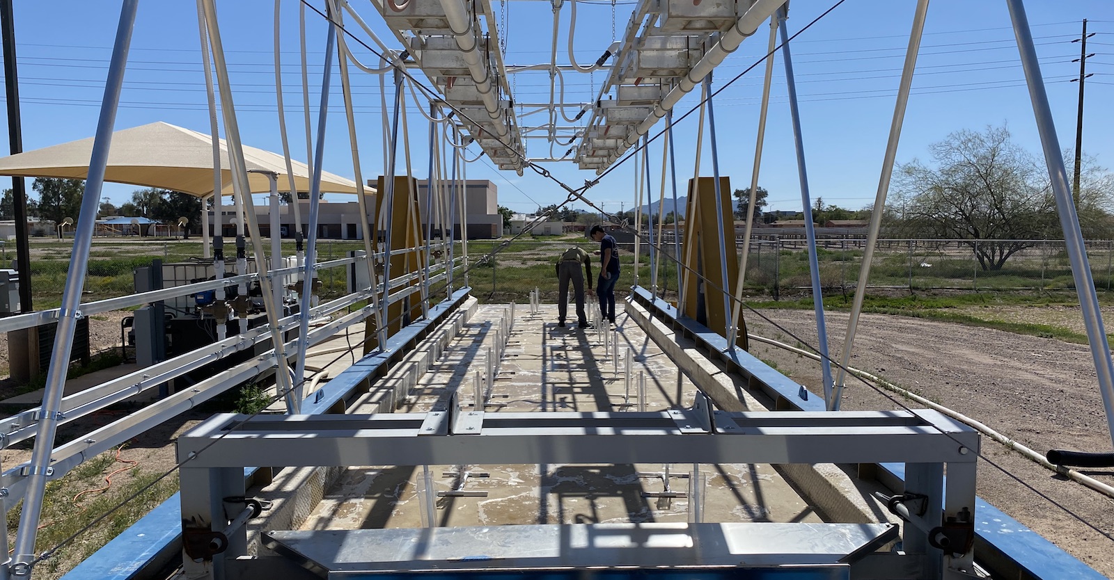 two students at the opposite end of what looks like a trailer