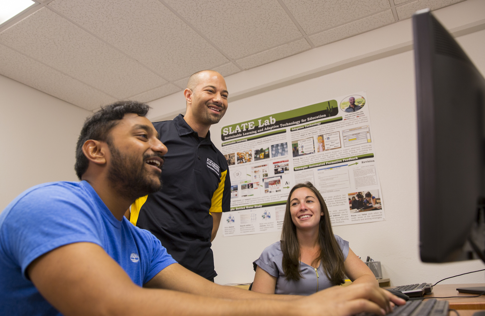Rpd Roscoe talking with a pair of students
