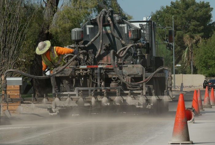 Trying to cool off neighborhoods with a new kind of road surface