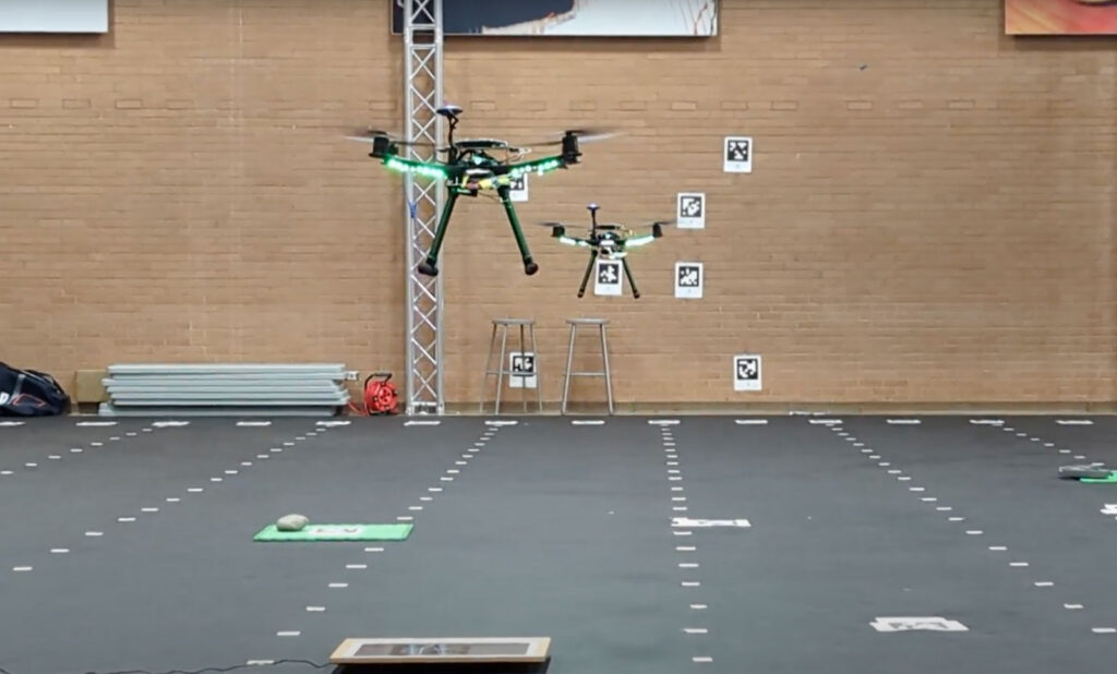 pair of drones flying