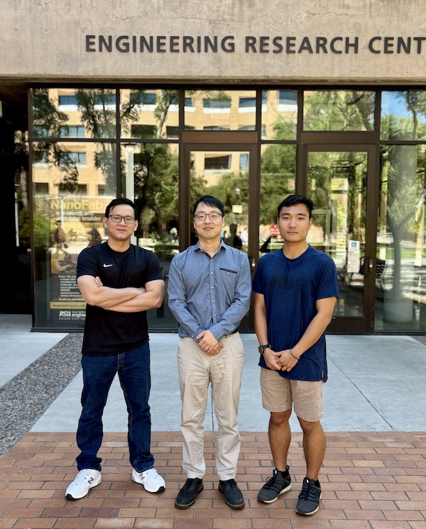 Nam Nguyen, Beomjin Kwon and Nagahiro Ohashi outside their laboratory