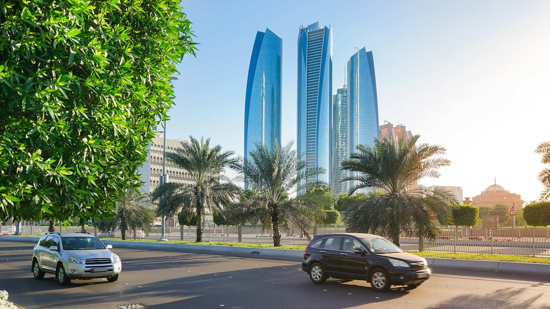 Cars travel on a street in Abu Dhabi,